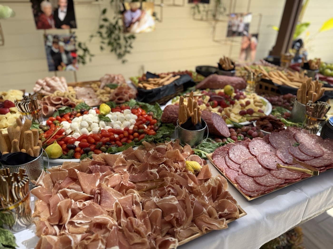Italian Brothers antipasti spread with cured meats, cheeses, olives and fruit